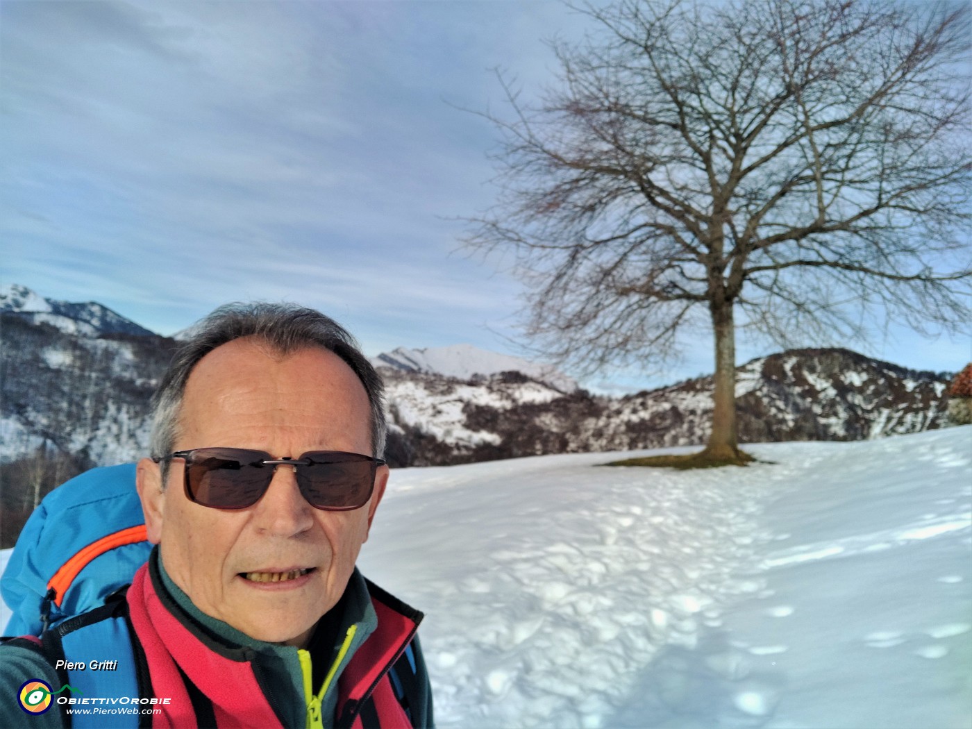 18 Uscendo dal bosco si aprono i bei pratoni innevati di Prato Giugno (1268 m).jpg